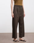 Pleated Curved-Leg Wool Trousers