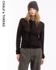 The Sculptural Scarf-Neck Sweater