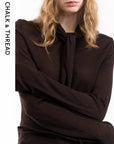 The Sculptural Scarf-Neck Sweater